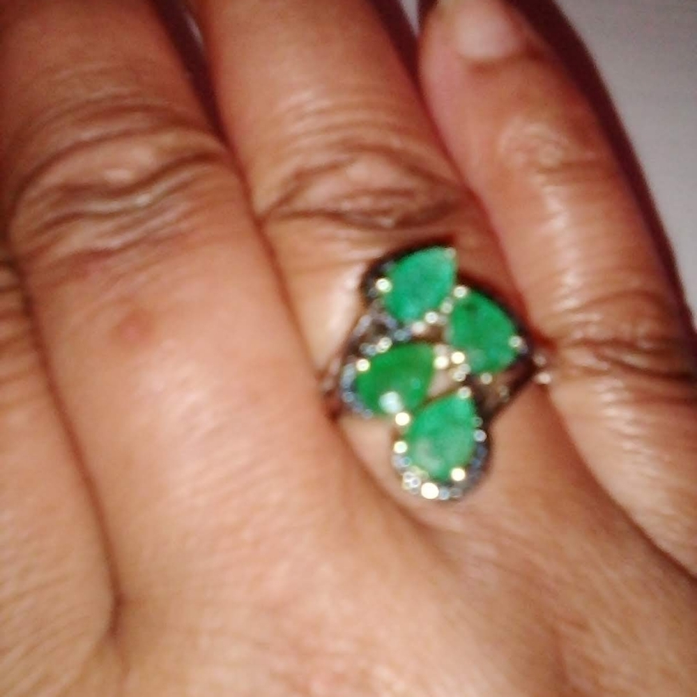ZAMBIAN GREEN EMERALD RING WITH BLACK DIAMONDS.